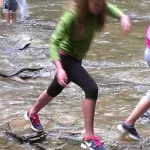 Alayna doing some rock jumping.