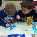 Drew and Benjamin play a file folder game