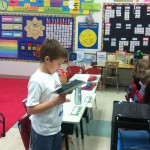 Aidan reading to Mrs. Pollock