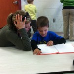 Ben reads to his mom