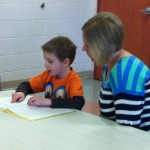 Evan reads to Mrs. Seiger