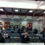 Poets spread out in the cafeteria