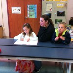 Meghan reads to her family