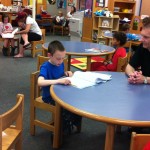 Noah reads "All About Fish"